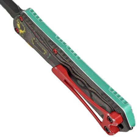 Nóż automatyczny OTF Heretic Manticore S T/E Bounty Hunter/Camo Carbon, Battleworn Black Cerakote MagnaCut by Tony Marfione Jr.